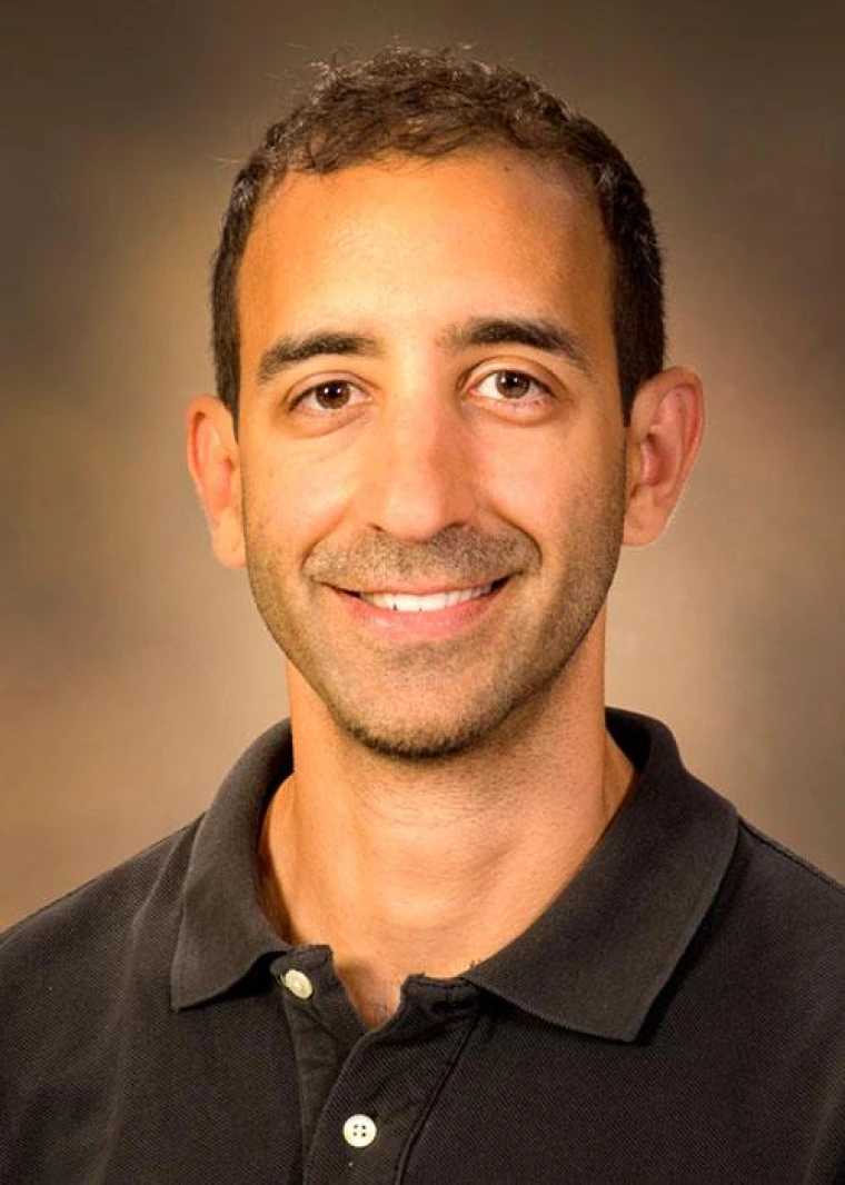 Yann C. Klimentidis