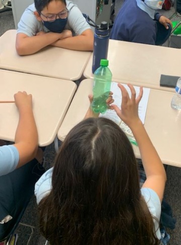 Sixth grade students learning about the quantity of sugar in popular sodas and beverages